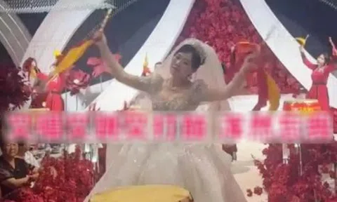 Cô dâu 38 tuổi gây tranh cãi vì trình diễn "lố" trong đám cưới