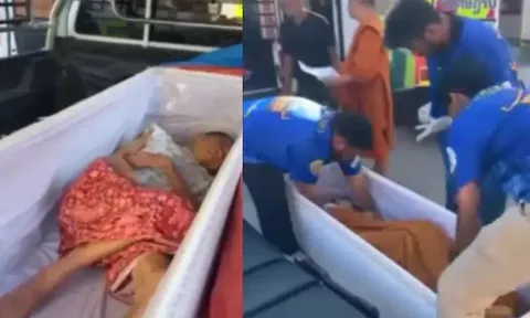 Mở quan tài ra thấy người bên trong mở mắt và gõ liên tục