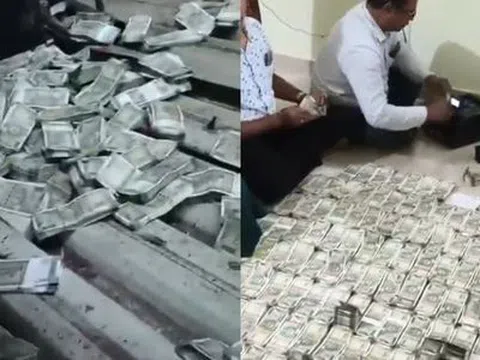 Người đàn ông ném hàng xấp tiền mặt qua cửa sổ và sự thật "động trời"