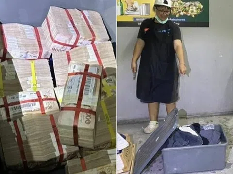 Nhặt chiếc thùng nhựa gần bãi rác, người phụ nữ hoảng hốt khi nhìn thấy 9,5 tỷ đồng