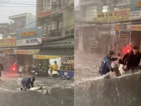 'Sốt' clip 3 thanh niên lao ra cứu chiếc xe máy bị mưa lớn cuốn trôi ở TP.HCM
