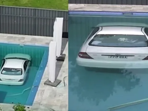 Ô tô mất lái đâm xuyên hàng rào, lao thẳng xuống bể bơi nhà dân
